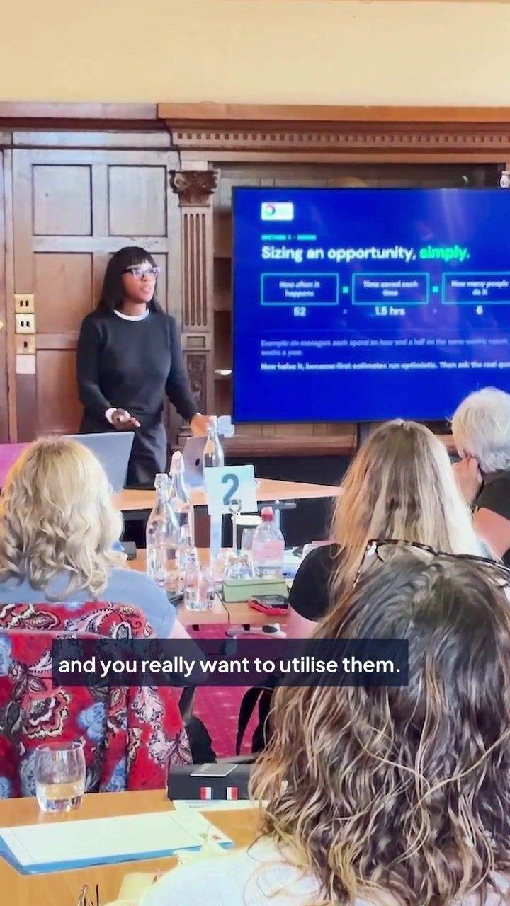 Haami, TESS AI trainer, speaking at a live TESS AI workshop