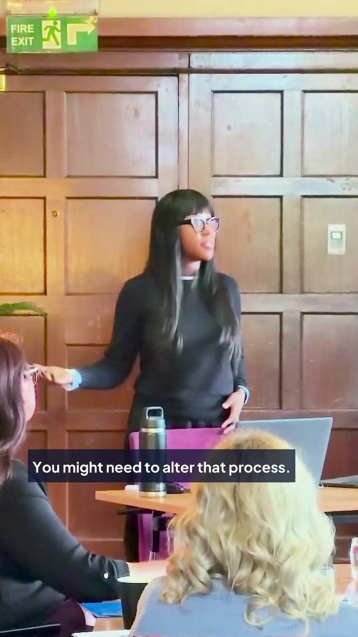 Haami, TESS AI trainer, speaking at a live TESS AI workshop